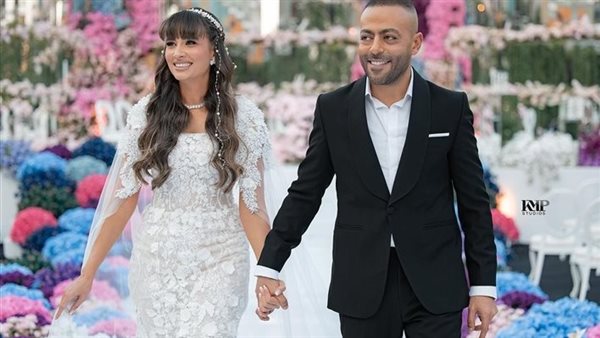تامر عاشور عن زوجته نانسي نور: " بتغير عليا جدا"