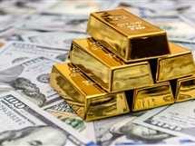 هبوط حاد لـ الدولار الأمريكي واستقرار أسعار الذهب الفورية